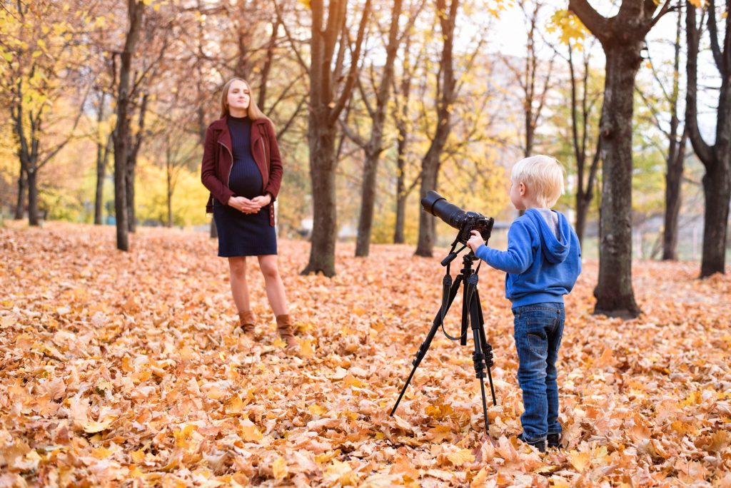 Pick a location with natural light to shoot your pregnancy memory book progress photos.