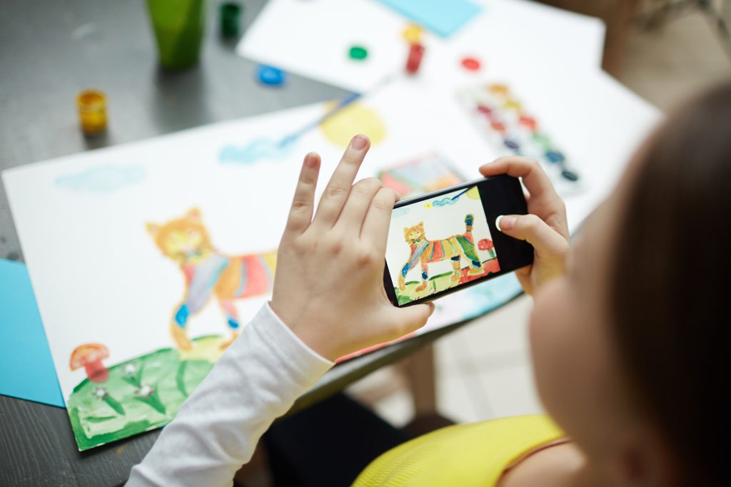 Follow these tips to take photos of your children’s artwork with an iPhone.