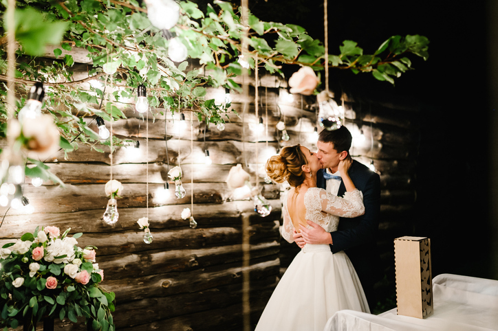 A wedding photo wall is a unique backdrop where guests can take photos.