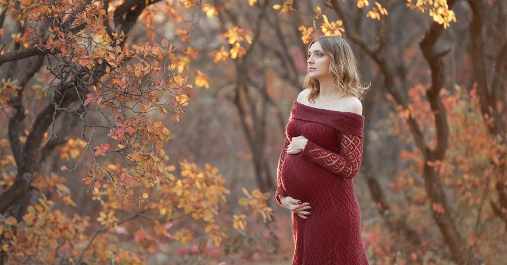 Dress up for a maternity photoshoot to feel glamorous.