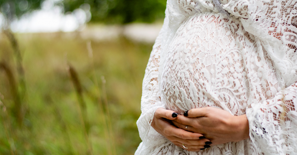 Show off your pregnancy style during a maternity photoshoot.